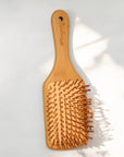 Bamboo Paddle Hairbrush - Square | Faire Market Bestseller
