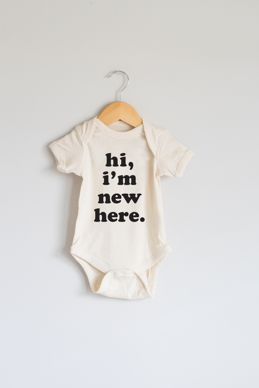 Cream hot sale baby onesie