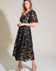 A woven lace midi dress